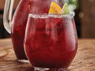 Pitcher of Blackberry Bramble Sangria first watch menu